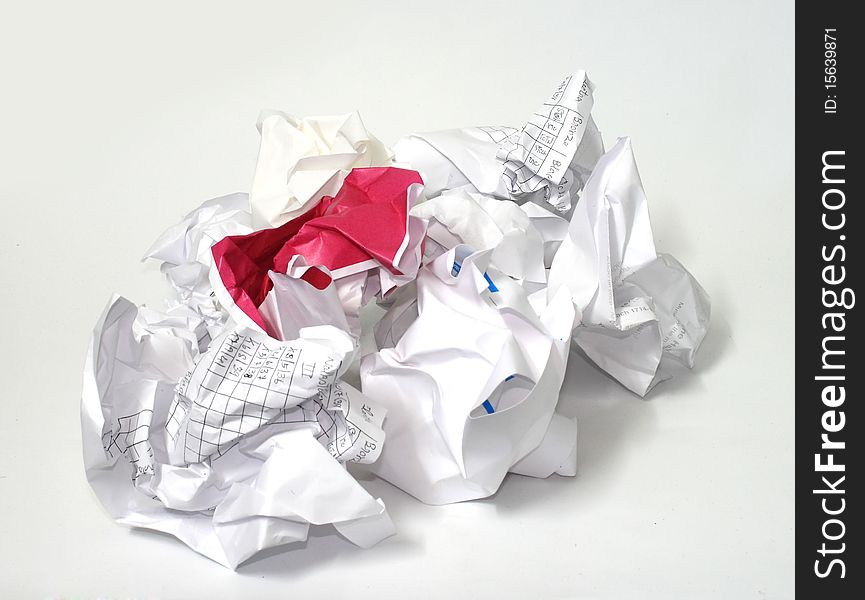 Heap of crumpled paper on white background