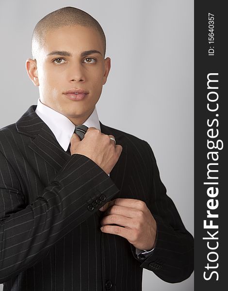 Good Looking Businessman On Gray