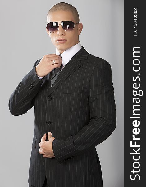 Good Looking Businessman On Gray