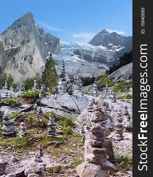 A garden of cairns standing below the Wetterhorn in Switzerland