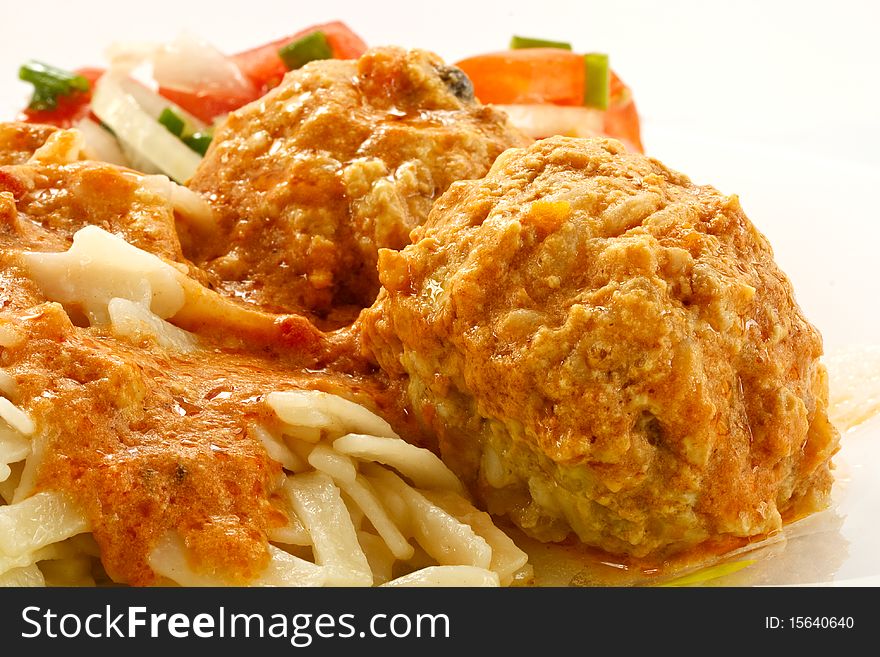 Meatballs with pasta with cream-tomato sauce. Meatballs with pasta with cream-tomato sauce