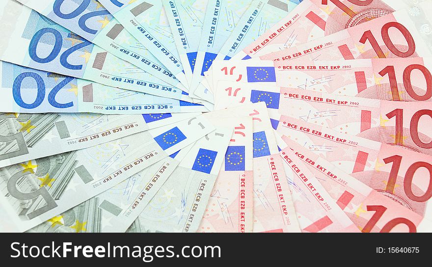 Background made from five, ten and twenty euro banknotes. Background made from five, ten and twenty euro banknotes