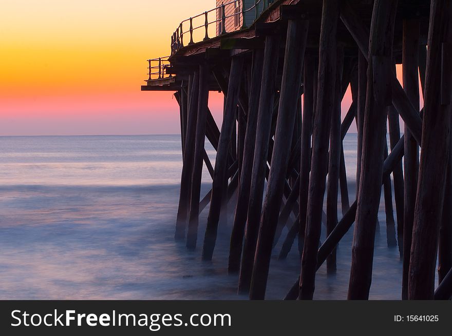 Fishing pier in North Carolina at sunrise. Fishing pier in North Carolina at sunrise