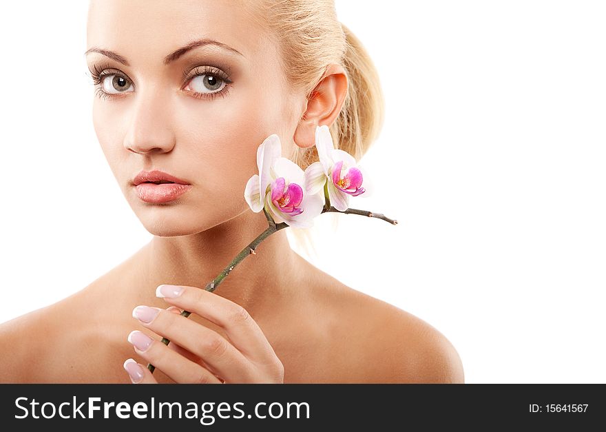 Young beautiful blond woman with white orchid. Young beautiful blond woman with white orchid