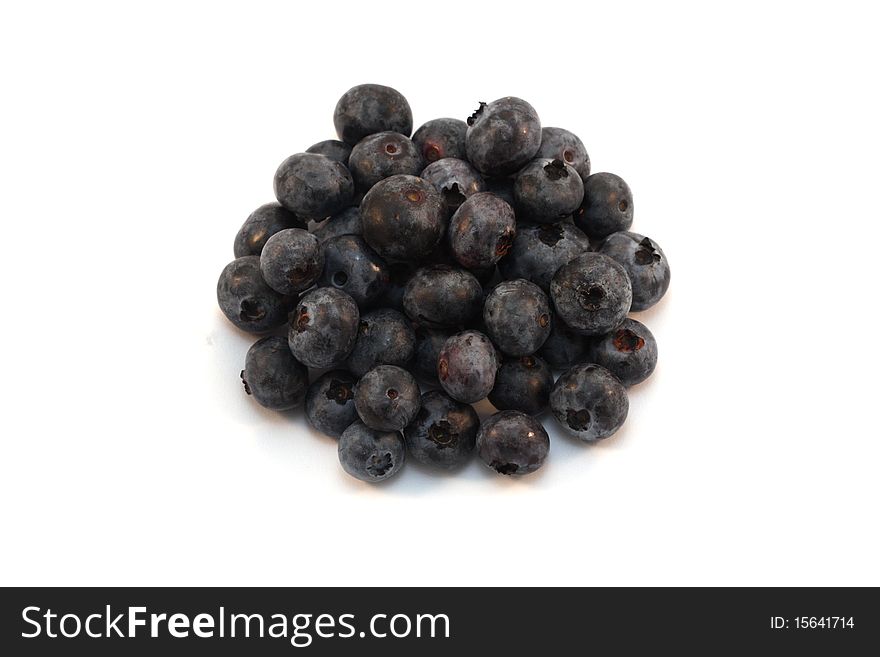 Several blueberries on the white isolated background.