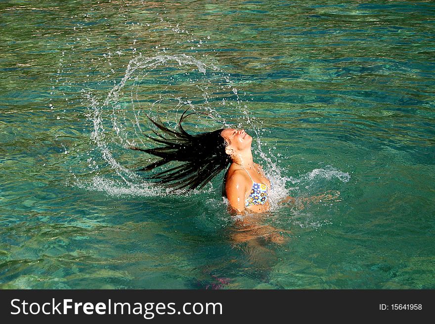 A girl having fun in Adriatic waters of Montenegro