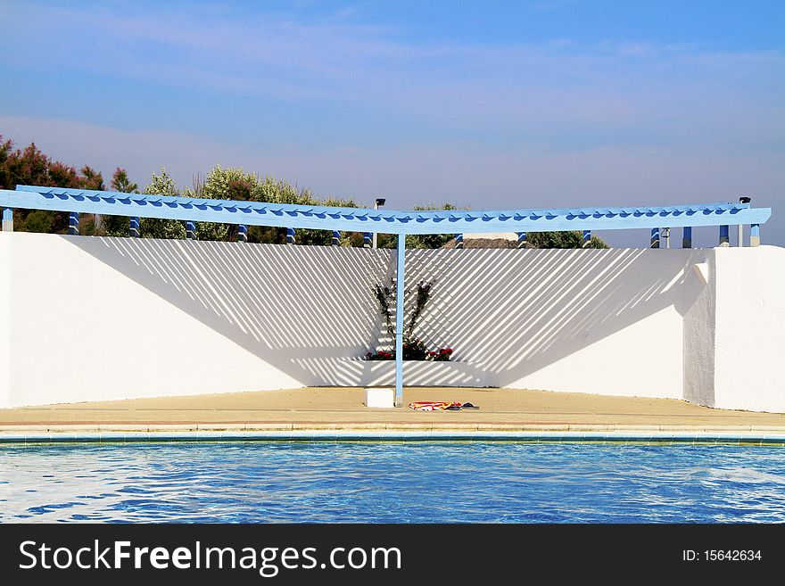 Outdoor swimming pool with wooden frame