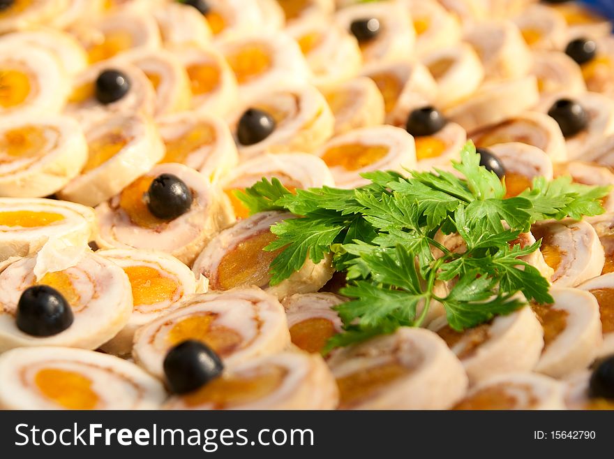 Ham Roll With Dried Apricots, Olives And Parsley.