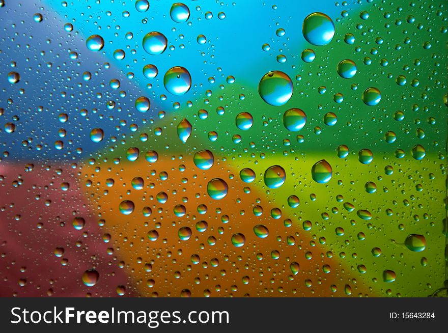 Many little water drops on the glass(multicolor). Many little water drops on the glass(multicolor)
