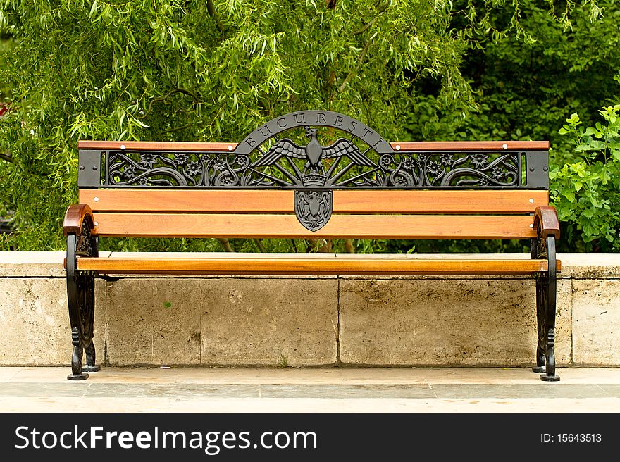 Bench in the park in Bucharest, Romania (the engravings say the name of the city)
