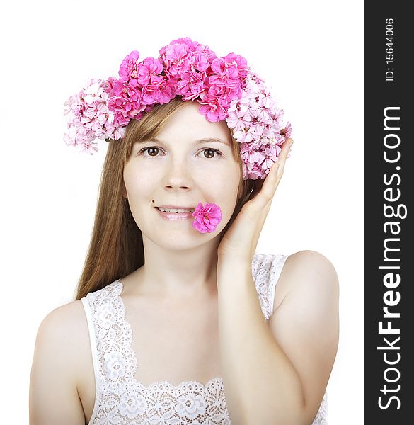 Image of beautiful young woman with wreath of flowers