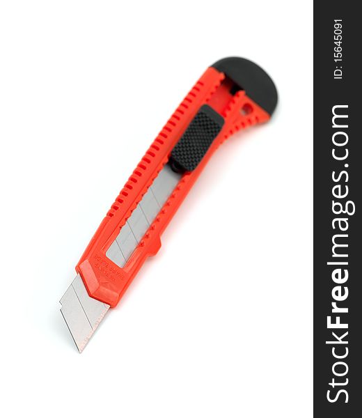 A box cutter isolated against a white background