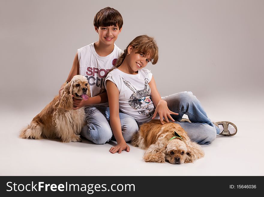 Boy and girl with dogs on isolated background. Boy and girl with dogs on isolated background