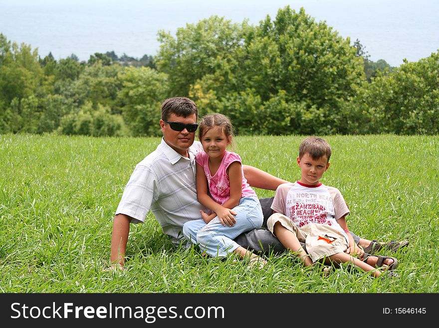 Happy daddy with children