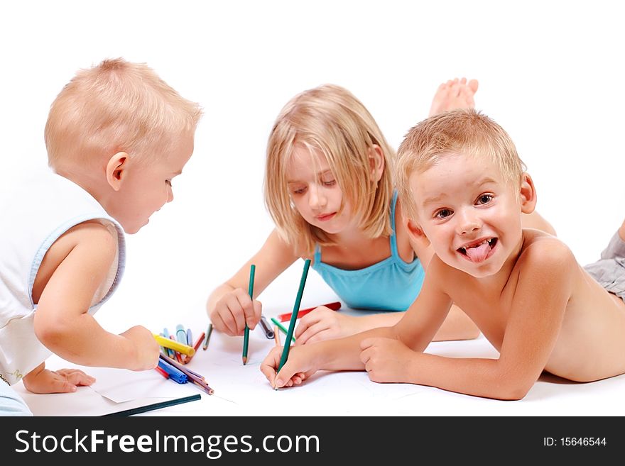 A group of children drawing on paper