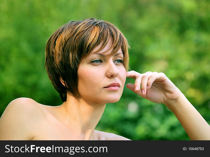 Face of a young girl being in nature