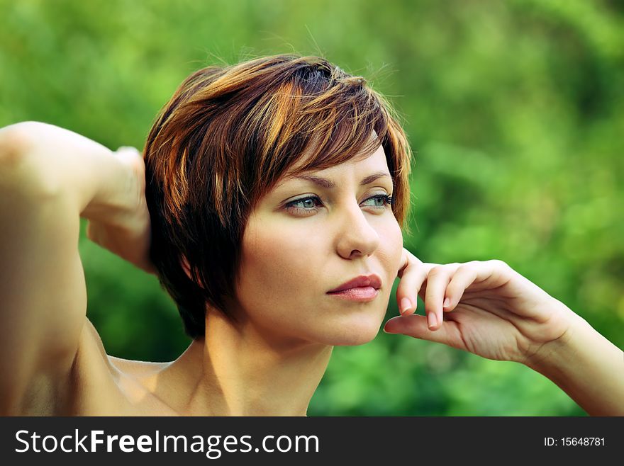 Face of a young girl being in nature