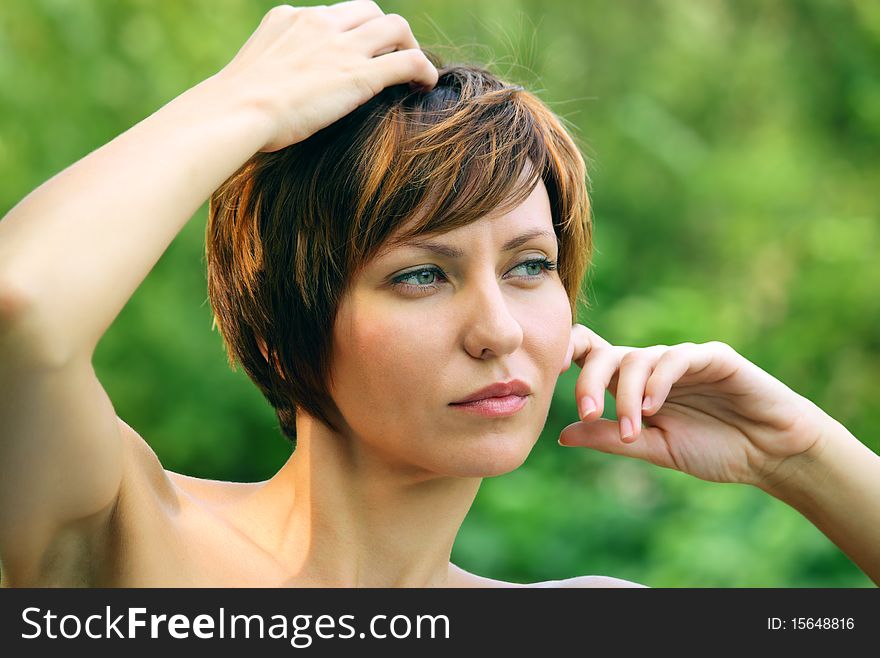 Face of a young girl being in nature