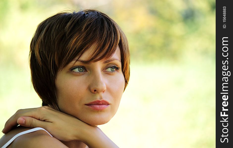 Face of a young girl being in nature