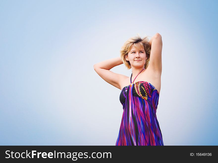 Young beautiful girl on a meadow