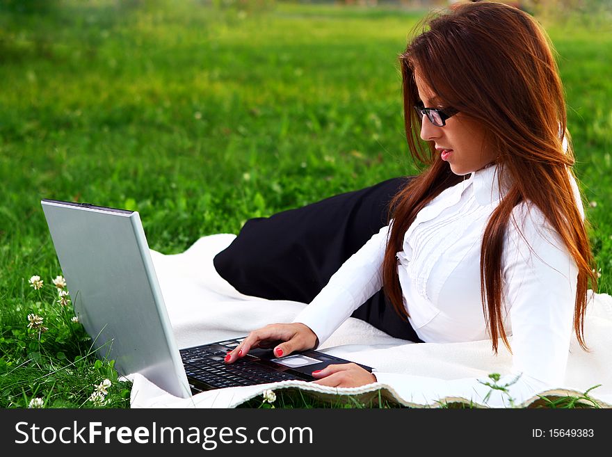 Young and beautiful girl doing school work