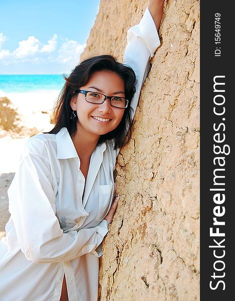 A young girl on the tropical beach. A young girl on the tropical beach