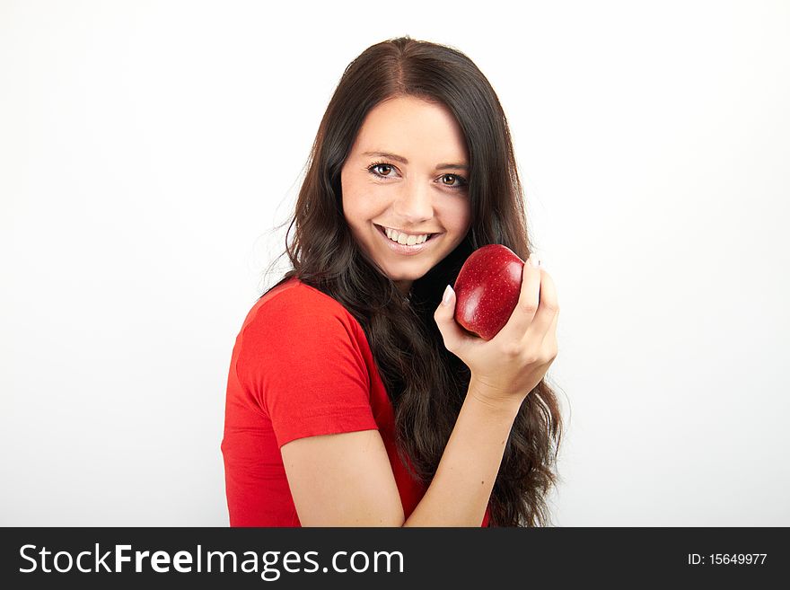 Smiling woman with an apple