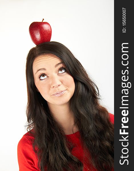 Smiling woman with an apple