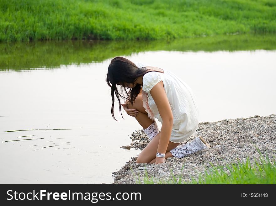 Pretty young woman in nature.