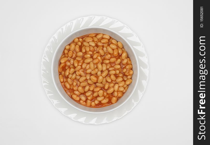 Bowl of baked beans on white background. Bowl of baked beans on white background