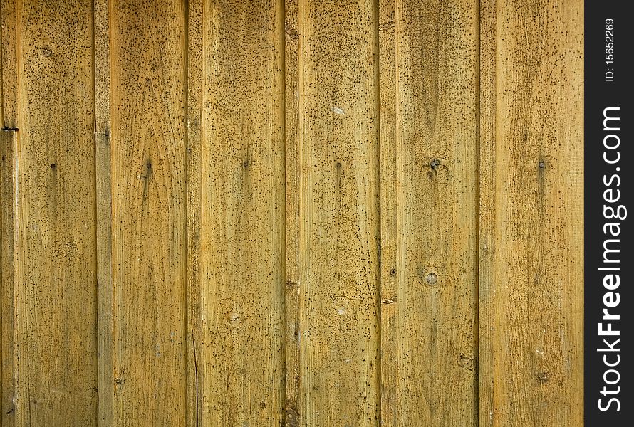 Plank background of old weathered wood. Plank background of old weathered wood