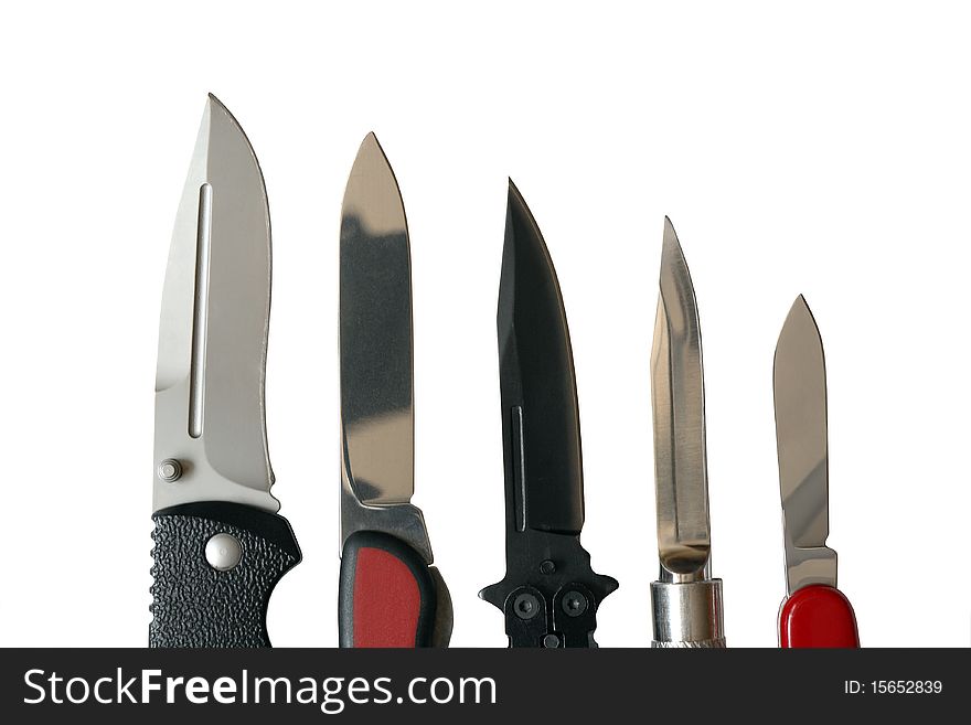 Closeup of few sharp knives isolated on white background with clipping path