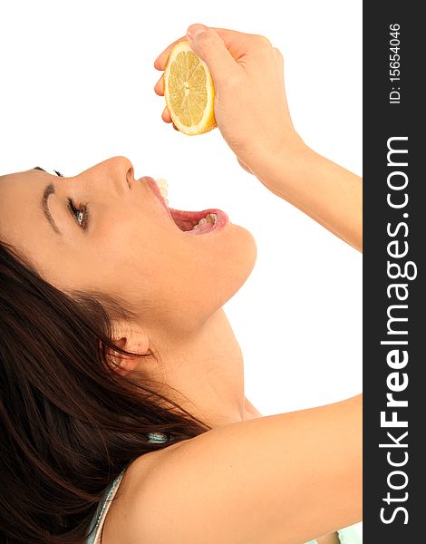 Beautiful young brunette woman holding a citron. Beautiful young brunette woman holding a citron