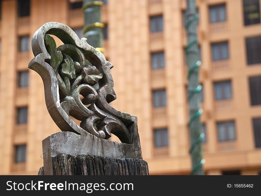 Image of carved details on old wooden structure. Image of carved details on old wooden structure