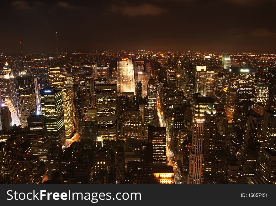 A shot of New York by night