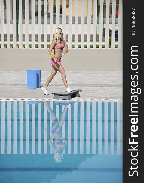 Fitness Exercise At Poolside