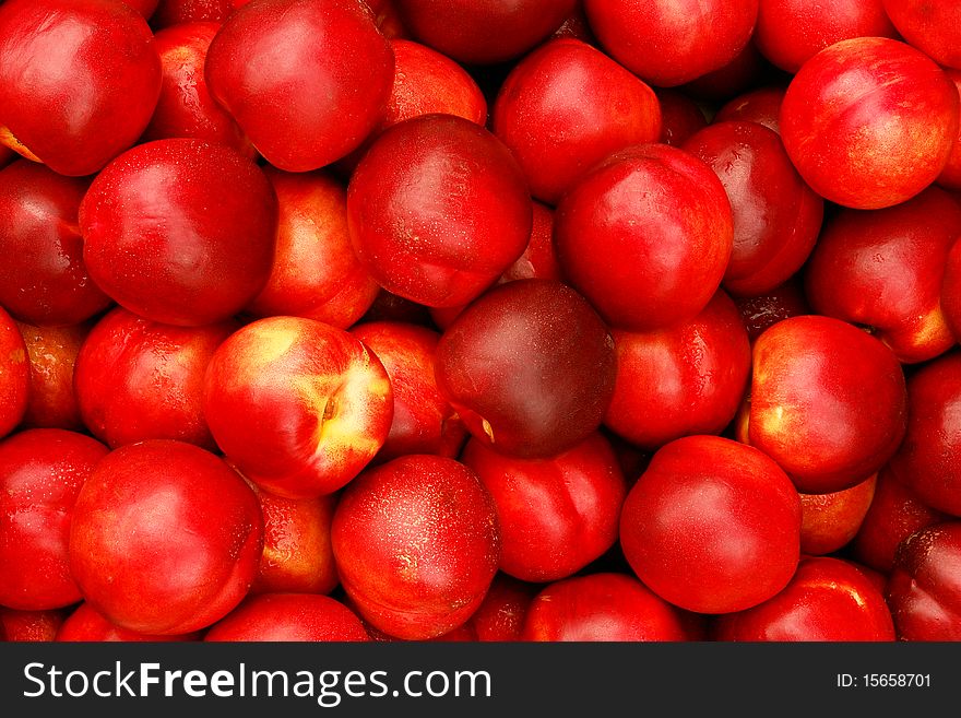 Many ripe nectarines, suitable for summer background. Many ripe nectarines, suitable for summer background