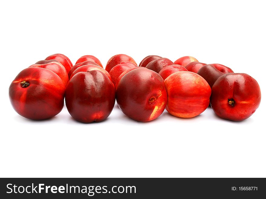 Many nectarines isolated on the white background. Many nectarines isolated on the white background