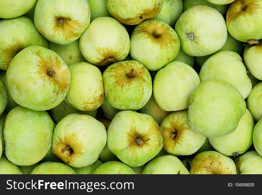 Bunch of organic fresh apples on a market