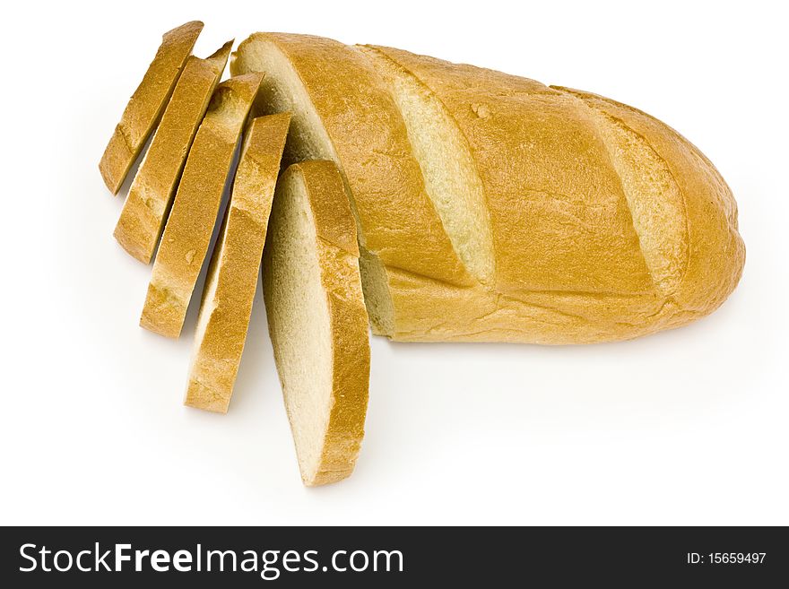 Cutted long loaf on the white background