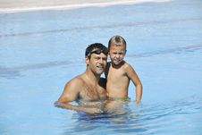 Happy Father And Son At Swimming Pool Royalty Free Stock Photos Happy Father And Son At Swimming Pool Royalty Free Stock Photos