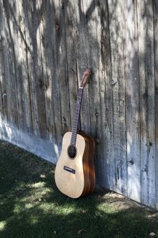 Guitar Resting On An Old Fence Royalty Free Stock Photo Guitar Resting On An Old Fence Royalty Free Stock Photo