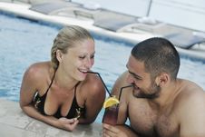 Happy Cople Relaxing At Swimming Pool Royalty Free Stock Photography Happy Cople Relaxing At Swimming Pool Royalty Free Stock Photography