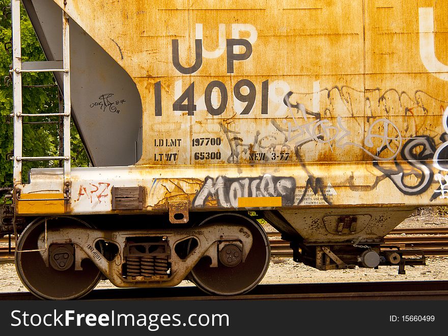 Side of old railroad wagon with graffiti tags. Side of old railroad wagon with graffiti tags