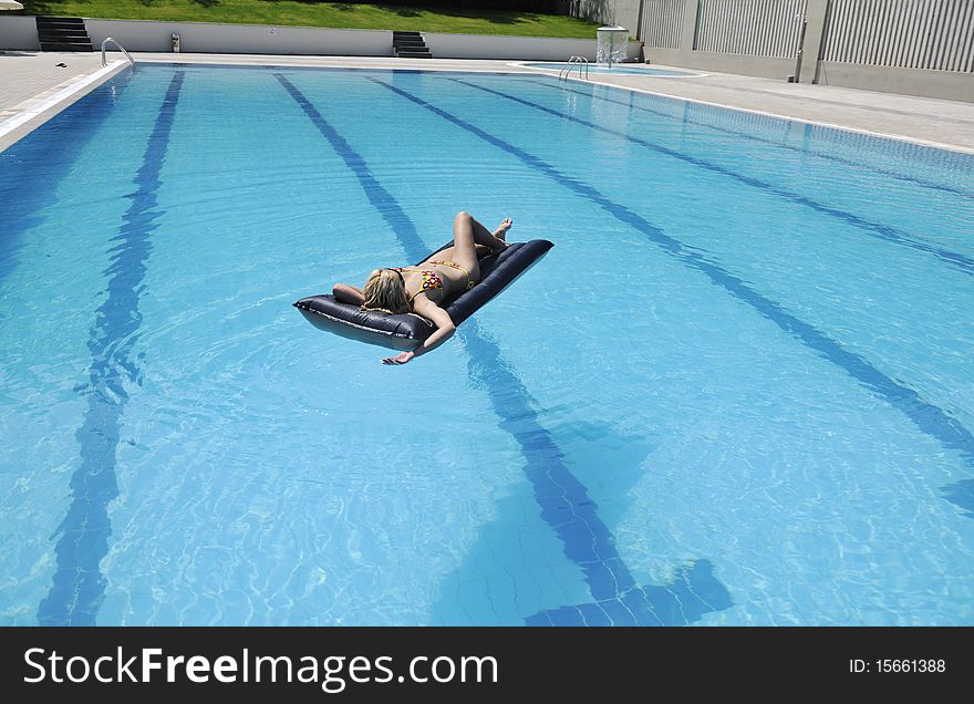 Woman Relax On Swimming Pool