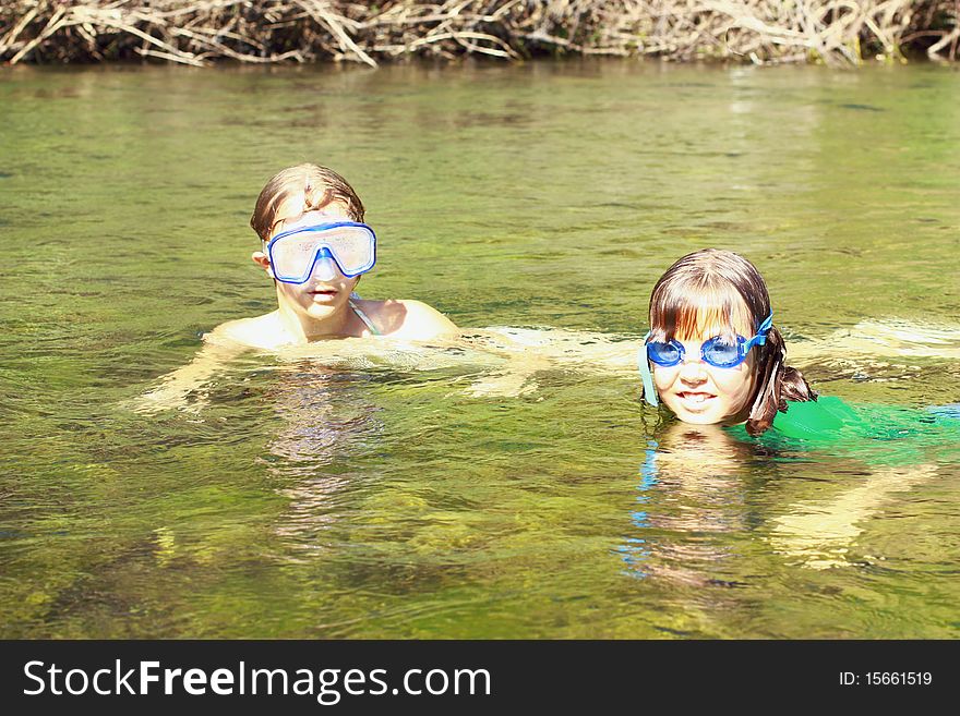 Girls Enjoying The River Water