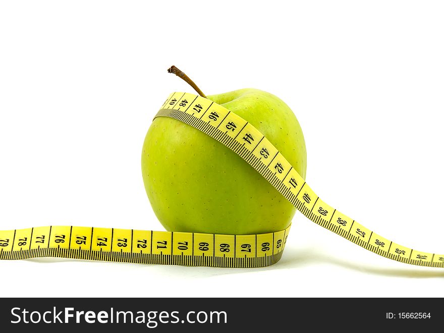 Green Apple isolated on white with measuring tape. Great diet concept.