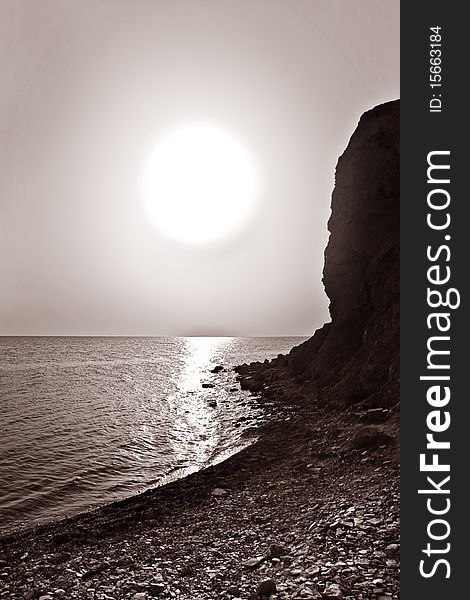 Vertical monochrome photo of beautiful bay. Black sea