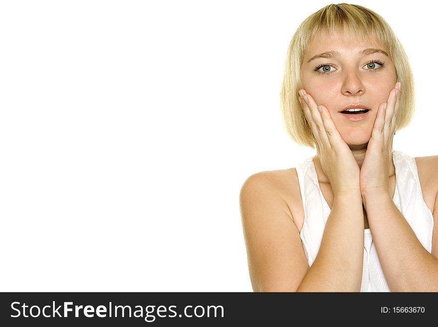 Close-up of a young woman looking surprised on white background