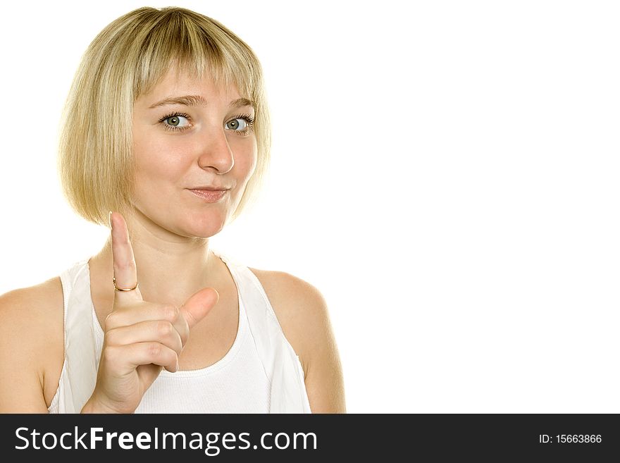 Young girl pointed a finger in the frame. Isolated on white background. Young girl pointed a finger in the frame. Isolated on white background